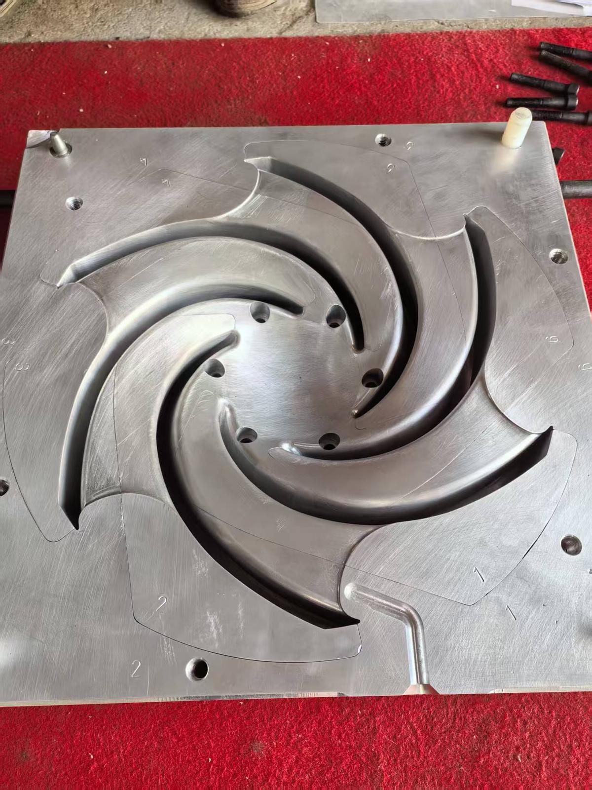 Aluminium impeller mould with machined vane cavities