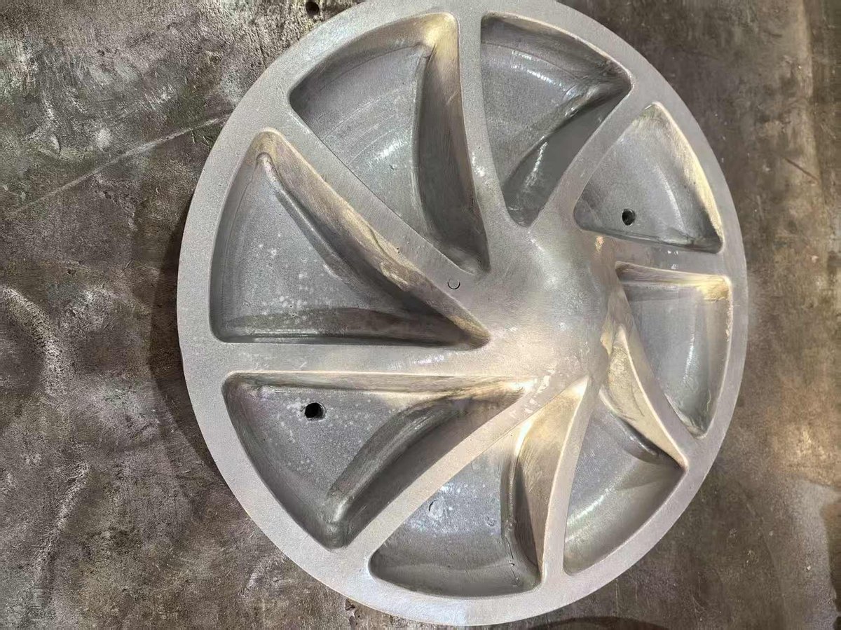 Impeller mould with curved vane profile